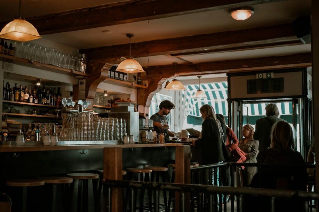 A warm and inviting café scene in Amsterdam, capturing the essence of European city life.